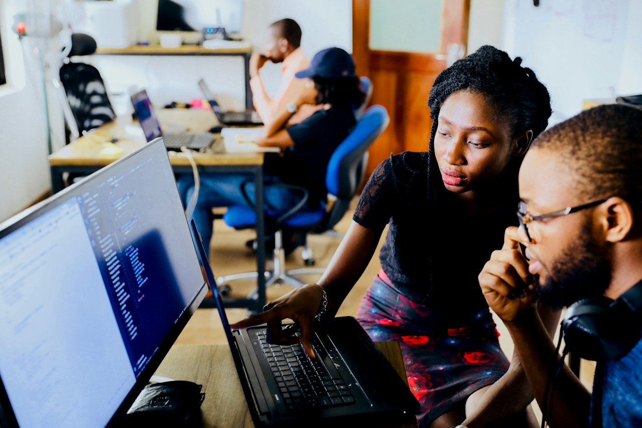 Professionals reviewing documents in an office