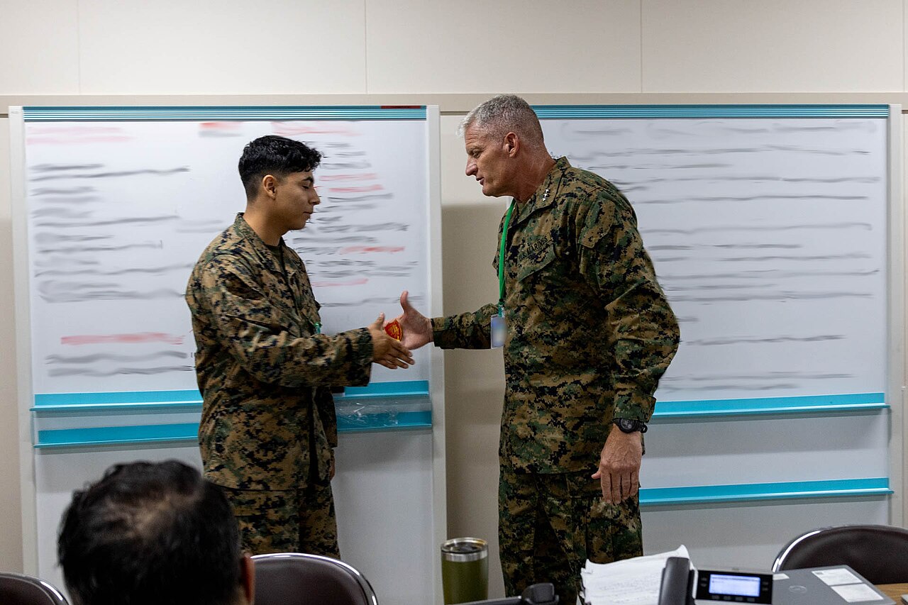 Personnel in a mission command operations centre