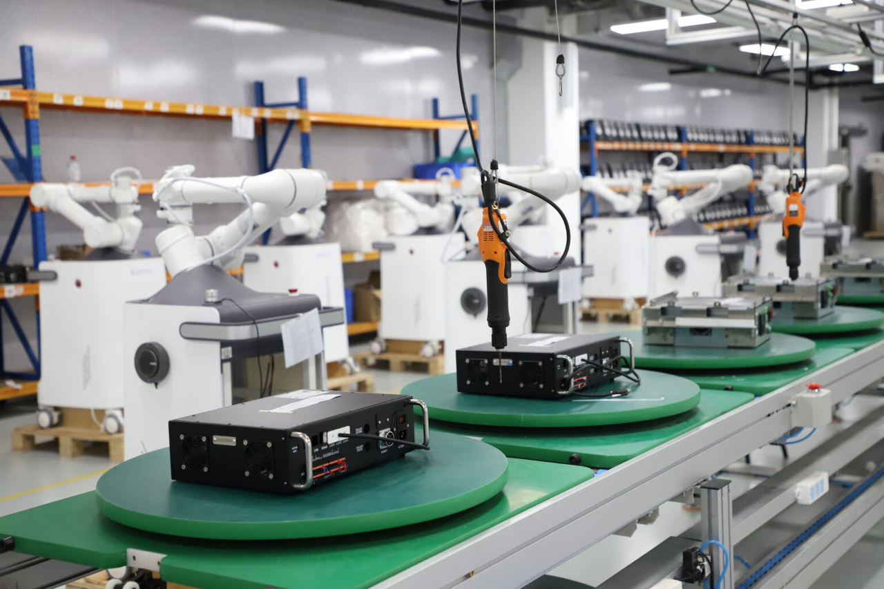 Manufacturing assembly line inside a production facility